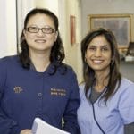Dr. Lin and colleague at Dentist's Office in Livonia, MI